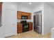 Kitchen with stainless steel appliances and wood cabinets at 931 S Porter Ct, Gilbert, AZ 85296