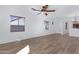 Living room with hardwood floors and ceiling fan at 931 S Porter Ct, Gilbert, AZ 85296