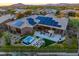 Aerial view of home with solar panels and hot tub at 9771 E Roadrunner Dr, Scottsdale, AZ 85262