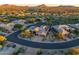 Aerial view of home nestled in a desert community at 9771 E Roadrunner Dr, Scottsdale, AZ 85262