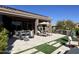 Relax and entertain on this expansive covered patio with seating at 9771 E Roadrunner Dr, Scottsdale, AZ 85262