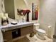 Elegant bathroom with modern vanity, large mirror, and decorative accents at 9771 E Roadrunner Dr, Scottsdale, AZ 85262