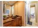 Guest bathroom with vessel sink and dark vanity at 9771 E Roadrunner Dr, Scottsdale, AZ 85262