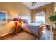 Bright bedroom with wood floors and a comfortable bed at 9771 E Roadrunner Dr, Scottsdale, AZ 85262