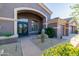 Home exterior with double doors and desert landscaping at 9771 E Roadrunner Dr, Scottsdale, AZ 85262