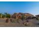 Desert landscape and a two-car garage at 9771 E Roadrunner Dr, Scottsdale, AZ 85262