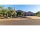 Xeriscaped front yard with mature desert plants at 9771 E Roadrunner Dr, Scottsdale, AZ 85262