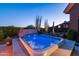 Relax in this outdoor hot tub, complete with a cover and lighting at 9771 E Roadrunner Dr, Scottsdale, AZ 85262