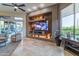 Open living area showcasing a comfortable sectional sofa and backyard access at 9771 E Roadrunner Dr, Scottsdale, AZ 85262