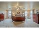 Large main bedroom with wood furniture and carpet flooring at 11526 W Scotts Dr, El Mirage, AZ 85335