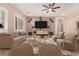 Spacious living room with a neutral color palette and modern furniture at 1228 N 102Nd St, Mesa, AZ 85207