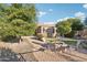 Landscaped backyard with fire pit and seating area at 12951 W Andrew Ln, Peoria, AZ 85383