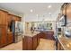 Well-equipped kitchen with an island, stainless steel appliances, and granite countertops at 12951 W Andrew Ln, Peoria, AZ 85383