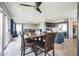 Spacious dining area seamlessly connects to the kitchen and living room, promoting an open, airy feel at 14850 W Laurel Ln, Surprise, AZ 85379