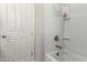 Clean bathroom with a tub and shower at 19122 W Solano Dr, Litchfield Park, AZ 85340