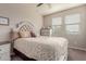 Bedroom with queen-size bed and dresser at 19122 W Solano Dr, Litchfield Park, AZ 85340