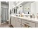 Bathroom with double vanity and a shower at 19544 W Lincoln St, Buckeye, AZ 85326