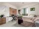 Comfortable bedroom featuring ample natural light, a playful decor, and a cozy bed for a personal retreat at 19544 W Lincoln St, Buckeye, AZ 85326