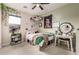Whimsical bedroom with natural light, decorative vines, and playful decor creating a cozy and inviting atmosphere at 19544 W Lincoln St, Buckeye, AZ 85326