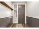 Bright entryway with wood floors and gray walls at 19544 W Lincoln St, Buckeye, AZ 85326