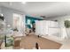 Spacious living area with a view of the loft featuring carpet flooring and ample natural light at 19544 W Lincoln St, Buckeye, AZ 85326