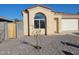 Cute single-story home with a small front yard at 20 W Whyman Ave, Avondale, AZ 85323