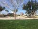 Outdoor basketball court with two hoops at 2636 S Sailors Way, Gilbert, AZ 85295