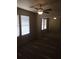 Bedroom with mirrored closet doors and window at 2636 S Sailors Way, Gilbert, AZ 85295