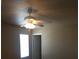 Bedroom with ceiling fan and window at 2636 S Sailors Way, Gilbert, AZ 85295