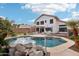 Relaxing backyard with a large pool and patio furniture at 2871 S Los Altos Pl, Chandler, AZ 85286