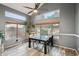 Casual dining area with glass-top table and chairs, near sliding glass doors at 2871 S Los Altos Pl, Chandler, AZ 85286