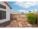 Built-in outdoor kitchen with gas grill and stone patio at 2871 S Los Altos Pl, Chandler, AZ 85286