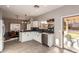 Modern kitchen with white cabinets and stainless steel appliances at 30052 N Desert Willow Blvd, San Tan Valley, AZ 85143