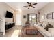 Bright living room with a neutral color palette and modern furniture at 30052 N Desert Willow Blvd, San Tan Valley, AZ 85143