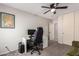 Home office featuring a desk, chair, and large window at 30052 N Desert Willow Blvd, San Tan Valley, AZ 85143