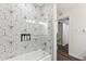 Stylish bathroom with geometric tile, glass shower, and modern fixtures at 3655 N 5Th Ave # 115, Phoenix, AZ 85013