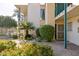 Apartment building exterior showcasing a patio with vibrant flowers at 3655 N 5Th Ave # 115, Phoenix, AZ 85013