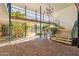 Indoor walkway with stairs, mailboxes, and a glimpse of the pool at 3655 N 5Th Ave # 115, Phoenix, AZ 85013