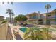 Community pool and spa area with surrounding patio furniture at 3655 N 5Th Ave # 115, Phoenix, AZ 85013