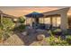 Relaxing covered patio and fire pit in a desert landscape at 392 E Laddoos Ave, Queen Creek, AZ 85140