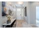 Bright and airy entryway with tile flooring and modern decor at 392 E Laddoos Ave, Queen Creek, AZ 85140