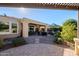 Covered patio with seating and dining areas at 392 E Laddoos Ave, Queen Creek, AZ 85140