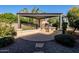 Outdoor kitchen with built-in grill under pergola at 392 E Laddoos Ave, Queen Creek, AZ 85140