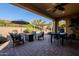 Spacious patio with seating area and fire pit at 392 E Laddoos Ave, Queen Creek, AZ 85140