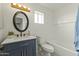 Renovated bathroom features a modern vanity, new fixtures, and a shower-tub combo at 4306 E Frye Rd, Phoenix, AZ 85048