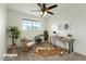 Bright bedroom setup as home office with natural lighting and cozy decor at 4306 E Frye Rd, Phoenix, AZ 85048