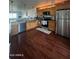 Bright kitchen with stainless steel appliances and wood flooring at 5031 N 81St St, Scottsdale, AZ 85250