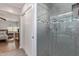 Modern bathroom with a walk-in shower and sliding glass doors at 5210 W Jupiter N Way, Chandler, AZ 85226