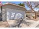 Attached single car garage with driveway at 5210 W Jupiter N Way, Chandler, AZ 85226