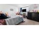 Bedroom with twin beds, dresser, and window at 5546 W Encanto Blvd, Phoenix, AZ 85035